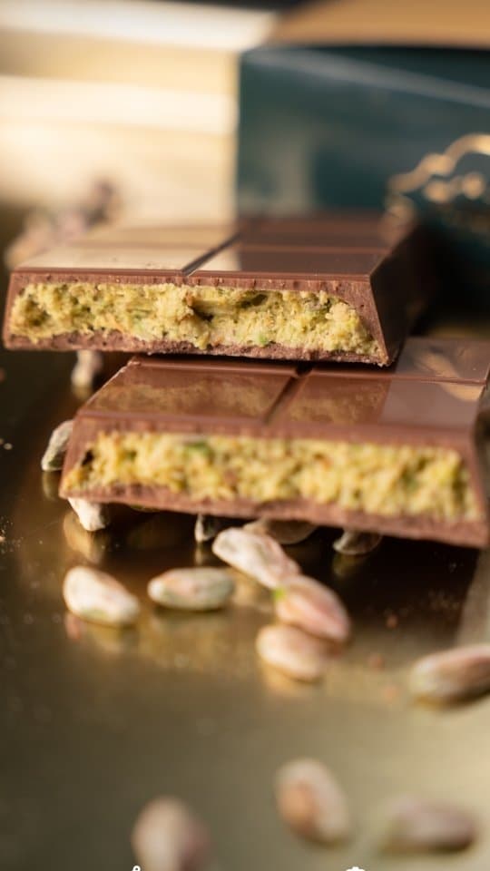 Dubai chocolate broken to show the pistachio centre