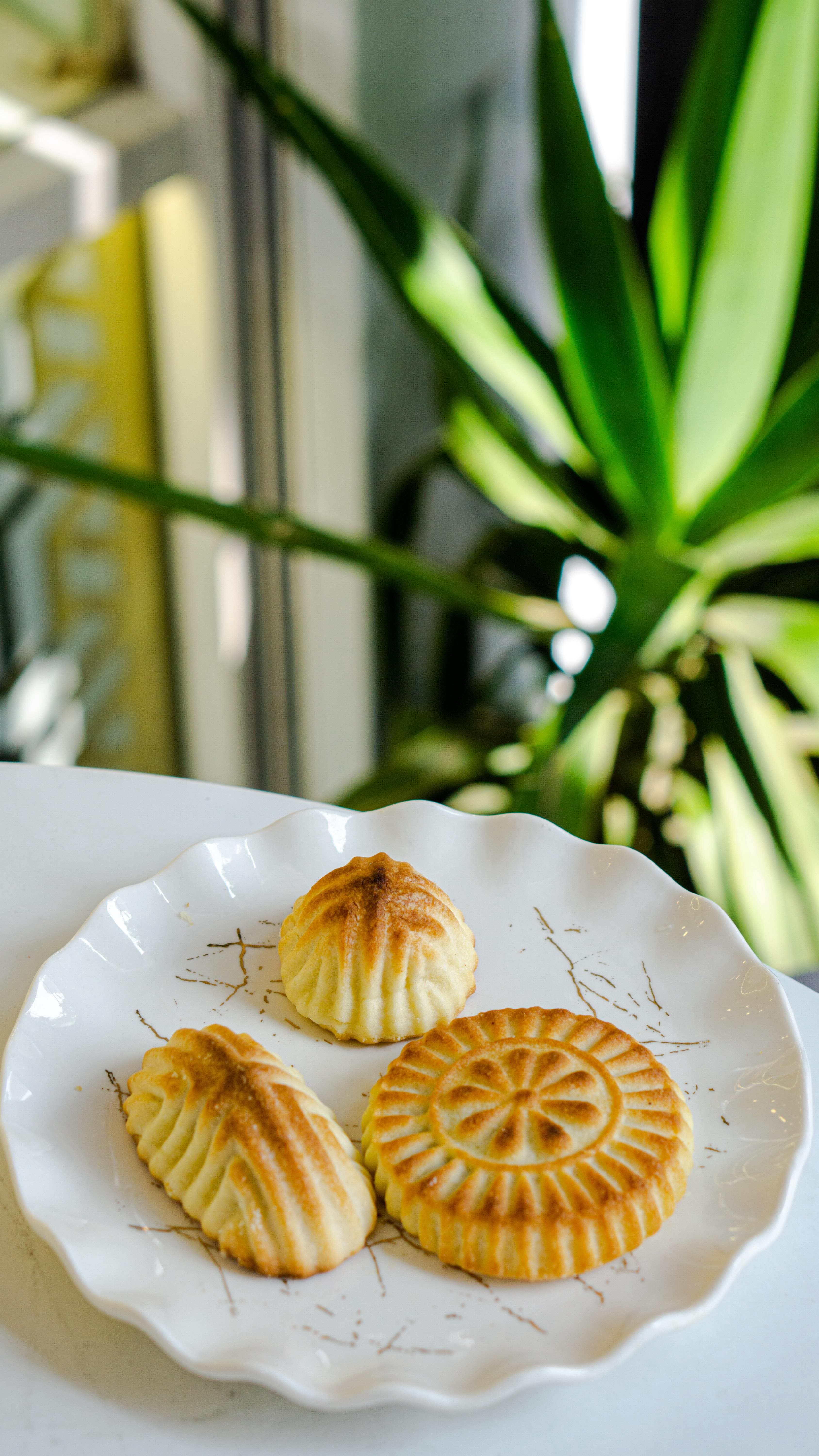 Three pieces of maamoul on a plate
