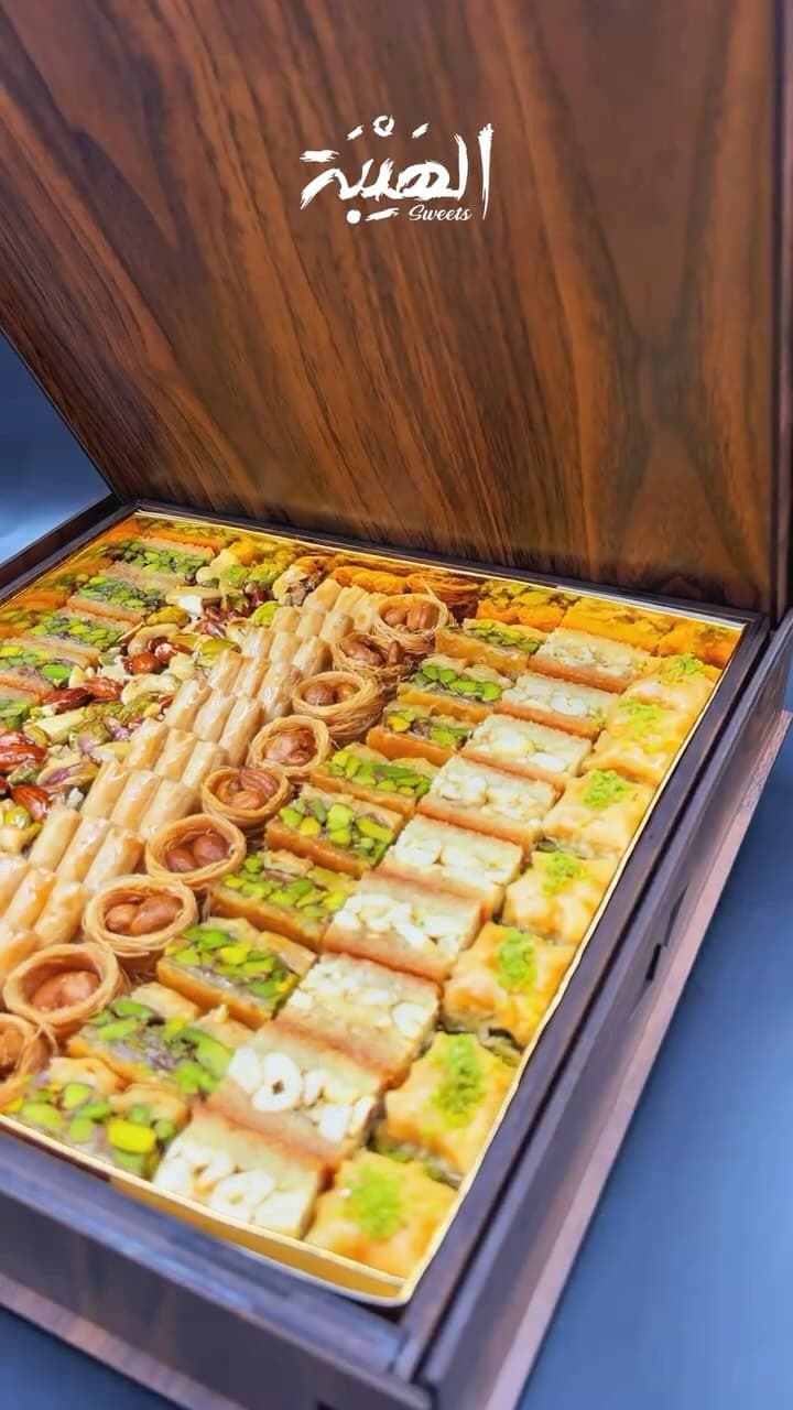 An open wooden Al Hayba box